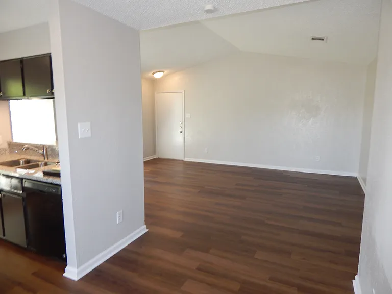 3 bed duplex view from dining room to family room