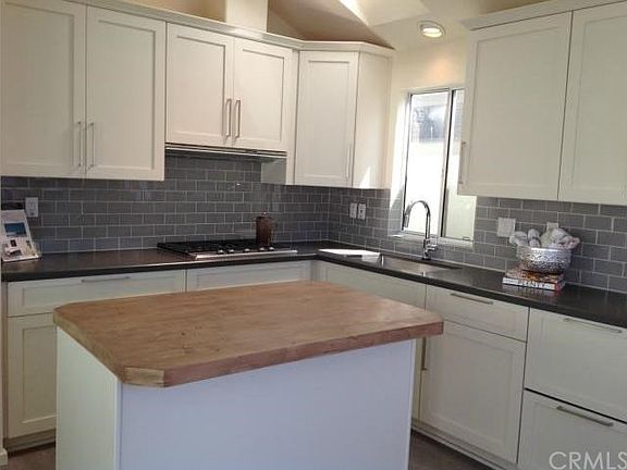 Remodeled kitchen with rolling island