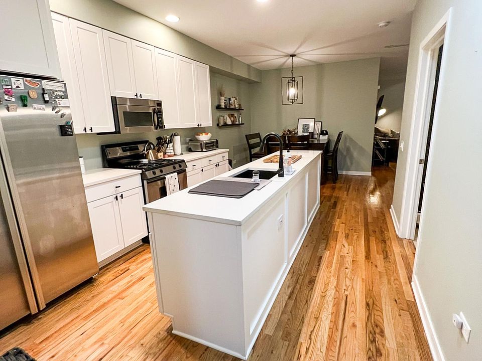 Kitchen featuring brand new quarts counters
