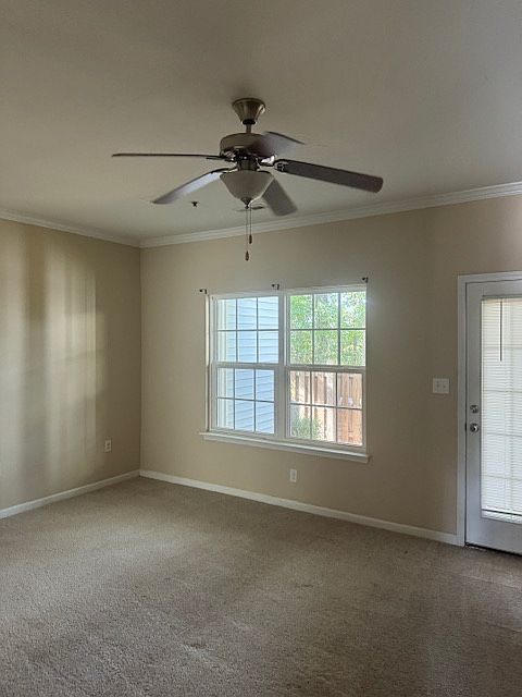 living room with ceiling fan