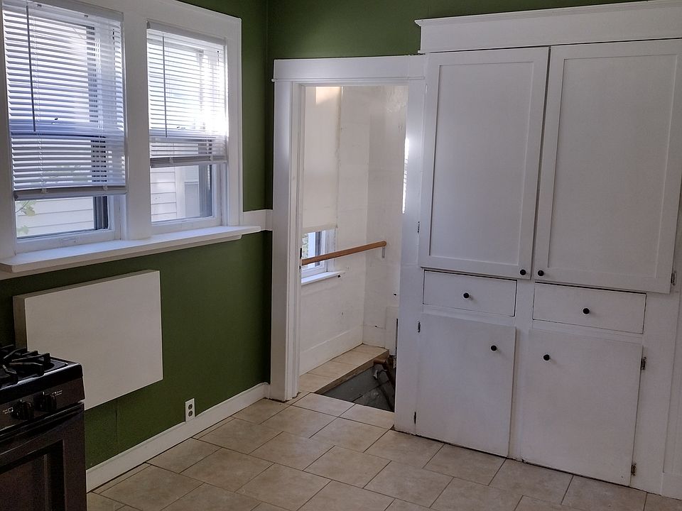 Kitchen view with basement access.