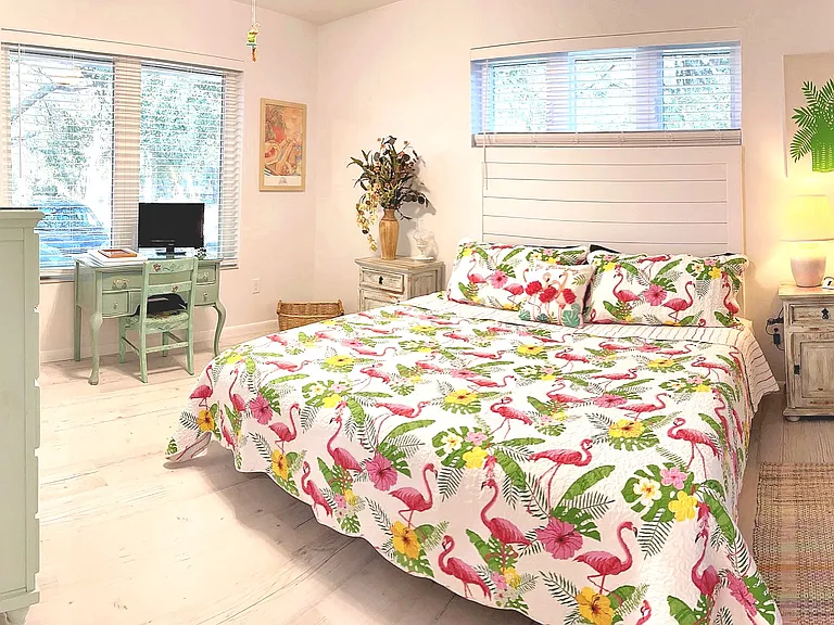 The King Bedroom can be changed into two twin beds. Enjoy the view of the lake from the desk. Walk-in closet and private bath compliment the room.