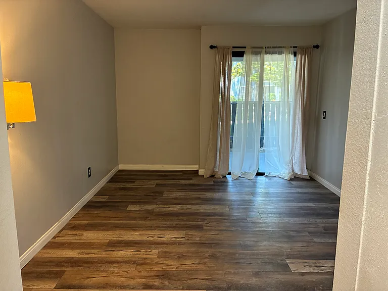 Bedroom One with door to Front Patio