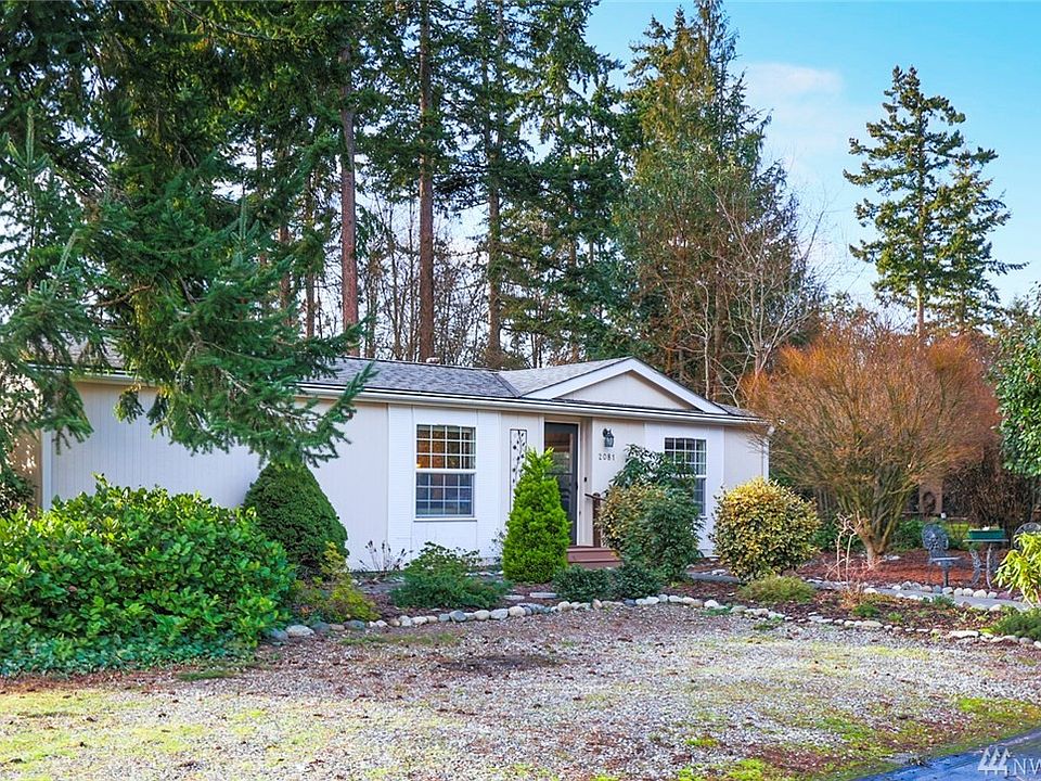 This loved and well cared for home sits on a large corner lot in the Towne Point community. 