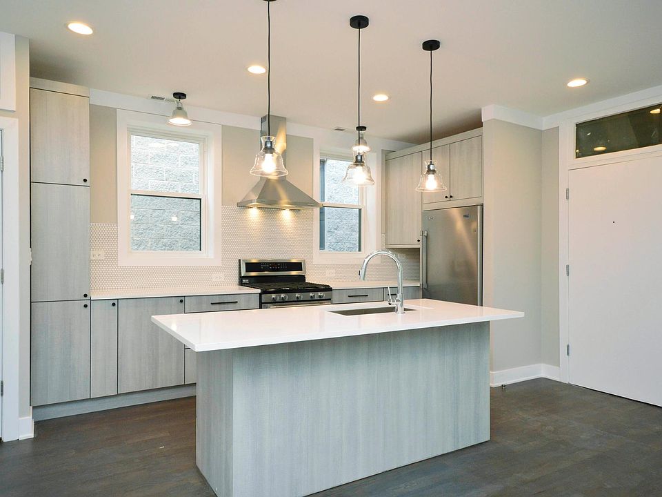 Kitchen - Stainless Steel Appliances, Quartz Countertops, includes Microwave, Disposal, and Dishwasher