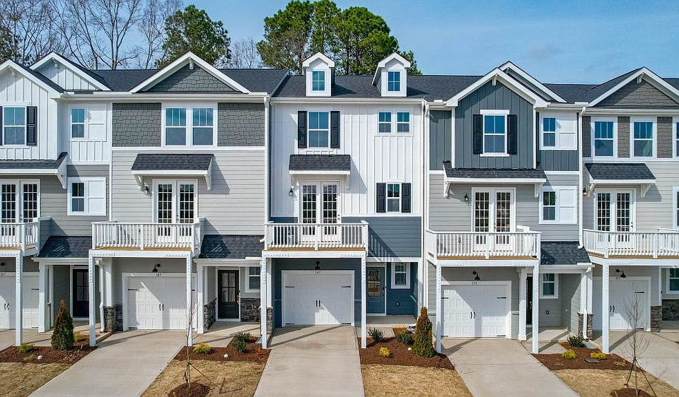 The Dunn- Farmhouse Elevation with Wood Deck Interior Unit