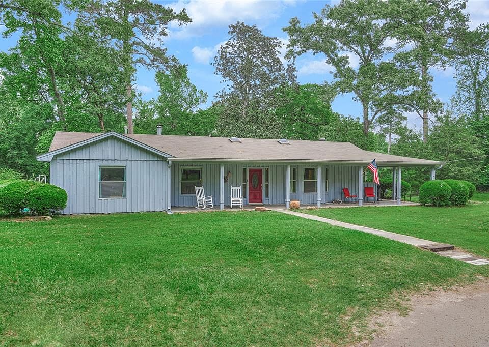 Beautiful 3 BR (could be 4 BR) 2 bath home nestled on almost 5 acres!