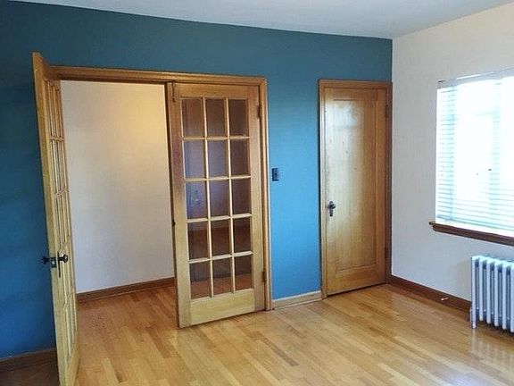 Reverse of front bedroom/office, closet door and accent wall