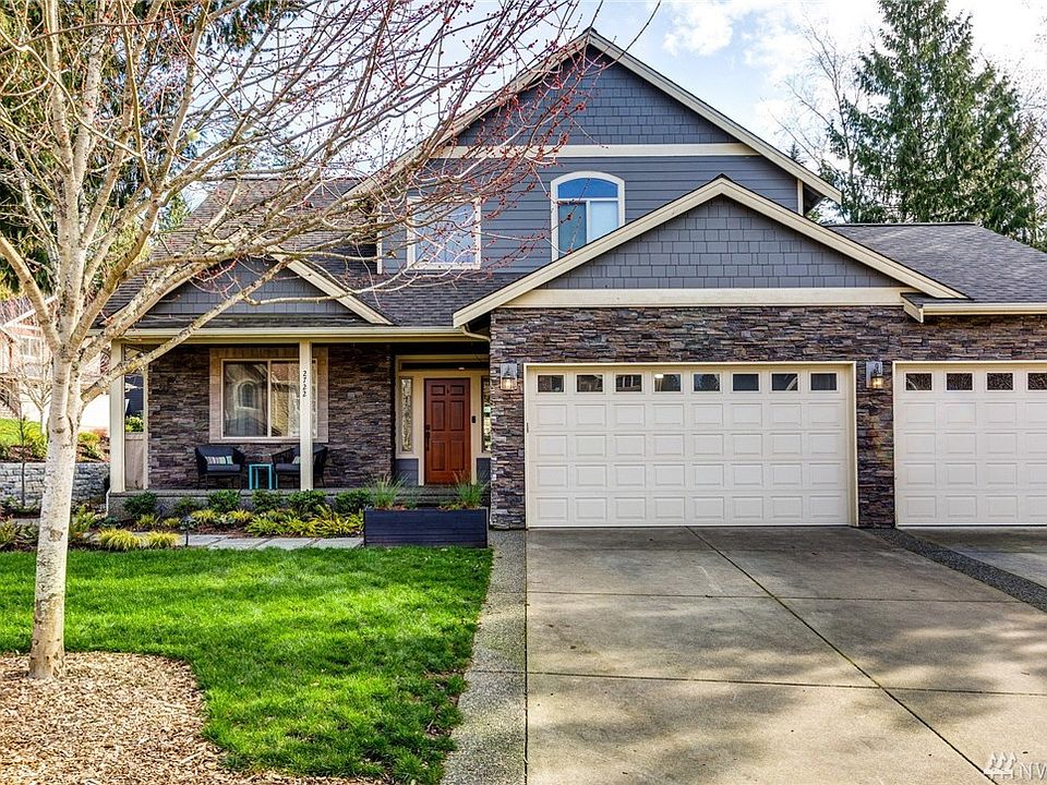 This home has beautiful curb appeal, large flat driveway and a three car garage.