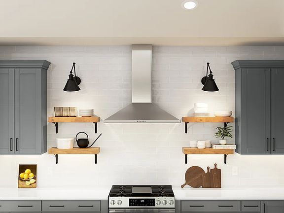 Kitchen with floating shelves and stainless steel hood