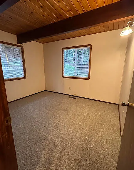 Same upstairs room but showing the windows with view upstairs