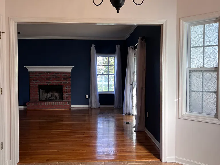 Kitchen looking into living room