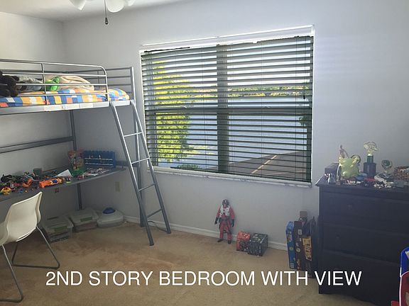 upstairs bedroom with lake view