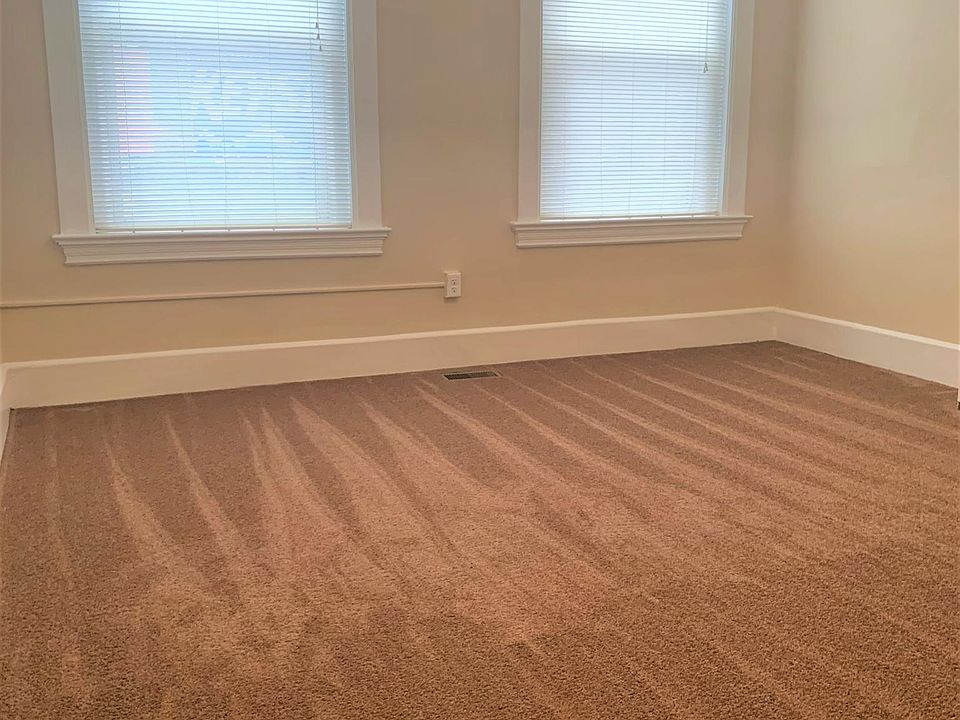 Living room with brand new carpets