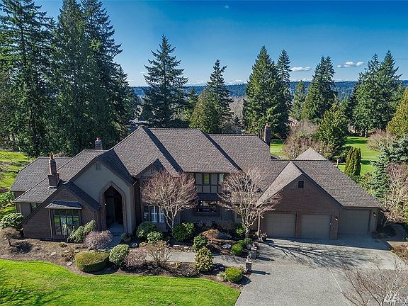 Home Is On The Prestigious 212th Drive In Bear Creek, And Located On The 15th Hole Of The Golf Course.  New Roof In 2012. View Of The Olympic Mountain Range On A Clear Day.