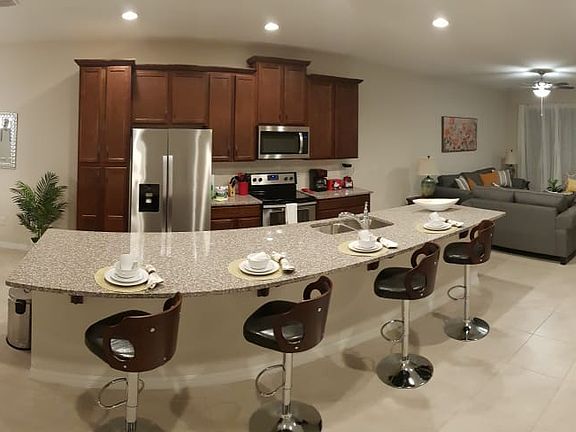 4th image of 1610 Carey Palm Cir