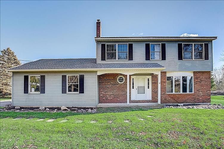 BEAUTIFUL COLONIAL ON LAKEFRONT LOT