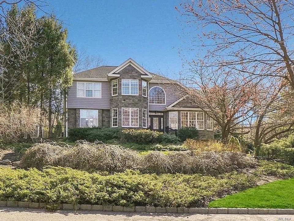 1st image of 12 Whispering Woods Dr
