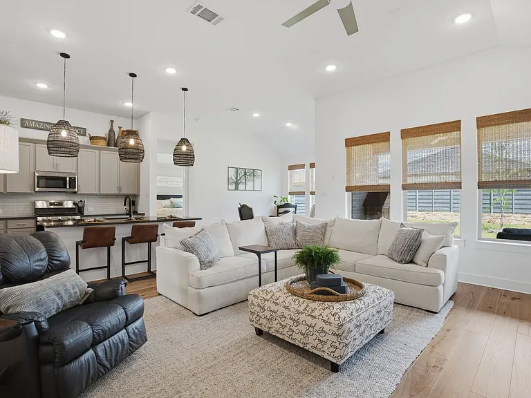 A favorite of the owners--high ceilings & natural light. Remote blinds on the living room & kitchen blinds.