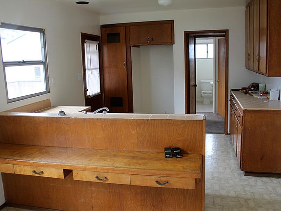 Looking from dining room to kitchen area