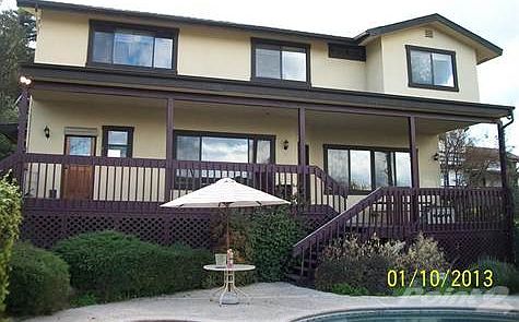 East view of home that faces the Sierra Nevada Mountains. Great views from all windows and Deck area.