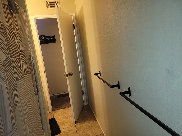Spacious bathroom adjacent the room.