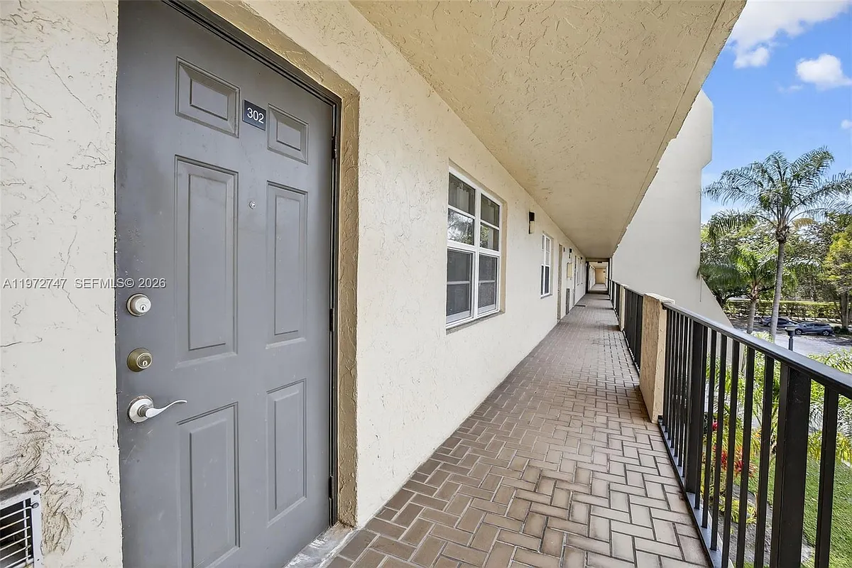 Photo 2 of 32 - 3300 W Rolling Hills Cir #302 - Davie, FL Building Photo - 3300 W Rolling Hills Cir #302