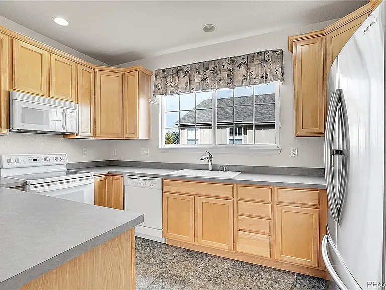 16956 W 63rd Dr — Photo 5