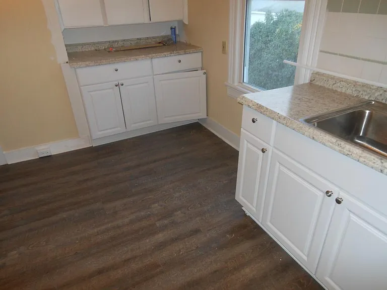 Kitchen, new sink, new faucette, new flooring, new paint.