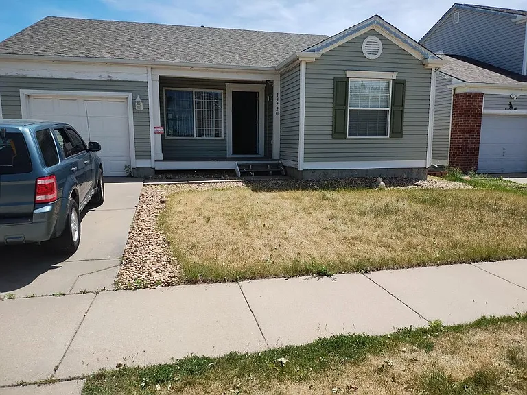 15720 E 48th Pl — Photo 1