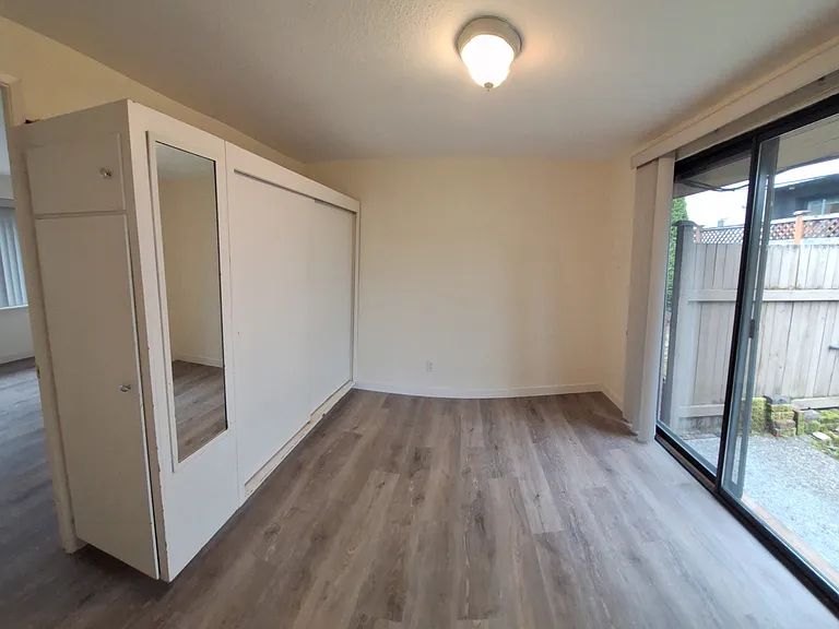 Bedroom with large closet space - roomy enough for a queen bed.