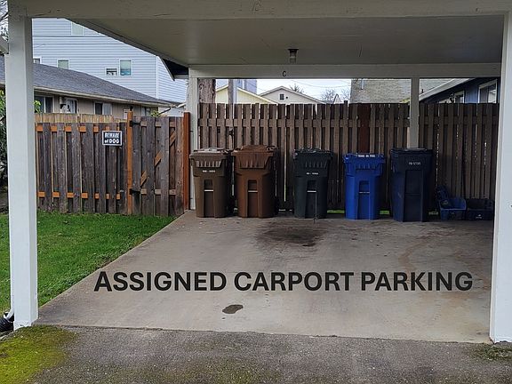 Assigned Carport: "Dedicated, covered carport parking w/ room for 2 cars double parked. Secure, off-street.