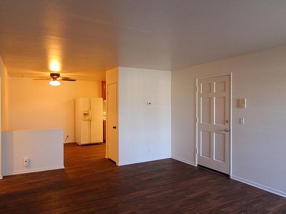 View from living room into dining room & Kitchen