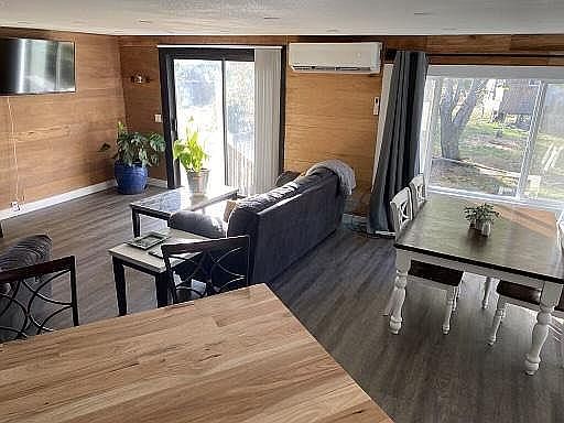 Open concept kitchen/living/dining room with lots of natural light