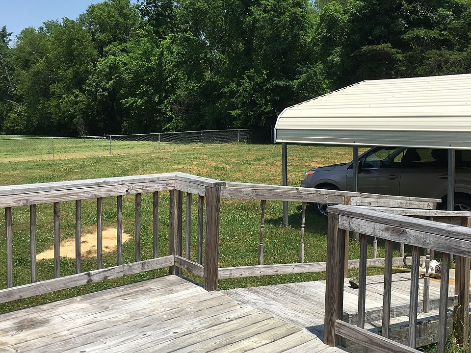 Backyard, partial fencing.