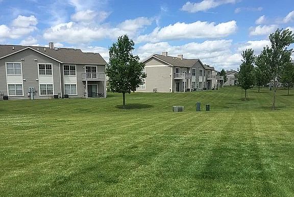 A lovely home in a quiet neighborhood with big green lawns and huge common areas for dog walking or kids playing!