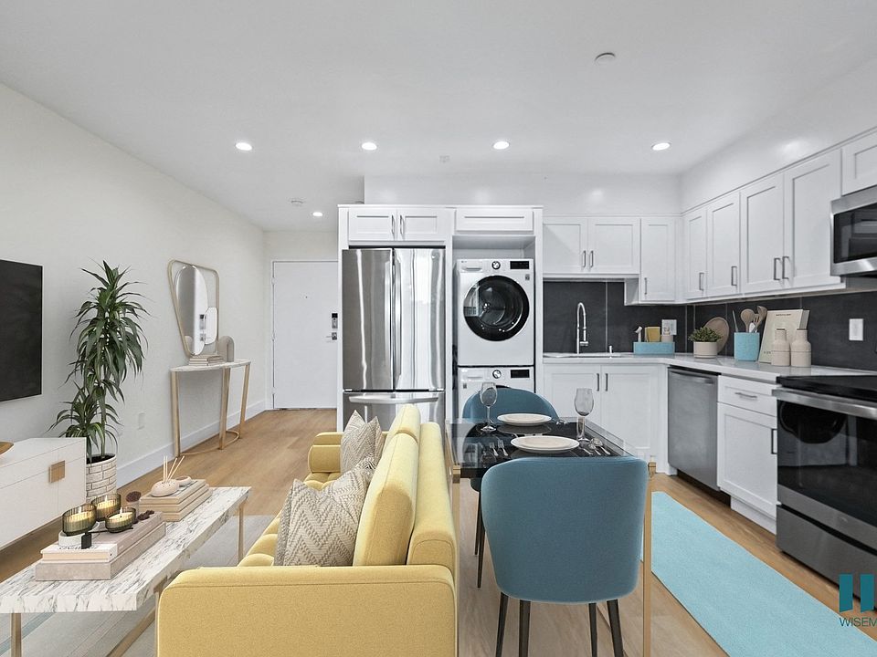 Open-Concept Kitchen with Energy-Efficient Appliances including In-Suite Washer & Dryer