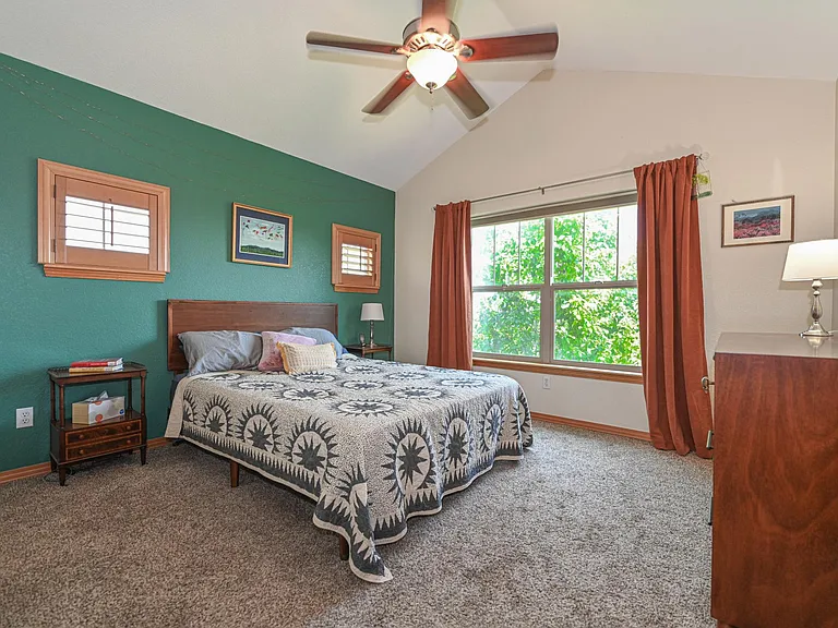 Primary bedroom with walk-in closet and ensuite bath