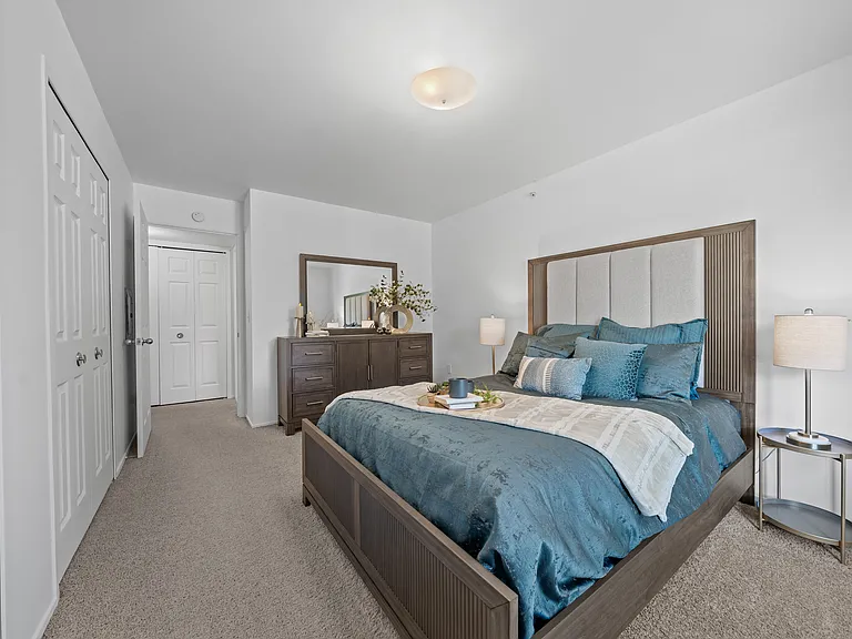 Bedroom with Ample storage space at Prentiss Pointe Apartments in Harrison Township, MI