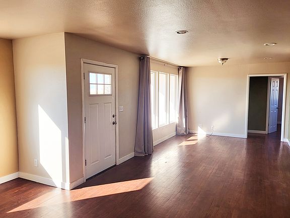 Front door, living room, hallway to bedroom #1 and bedroom #2