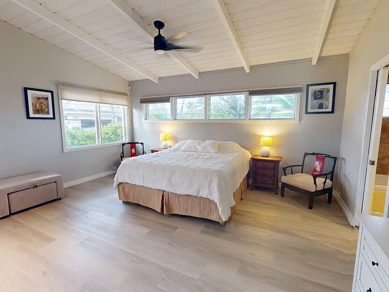 Lower master suite with tub and full bath.