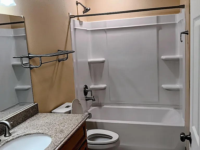 One bathroom house new tub