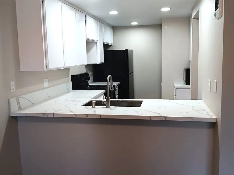 From dining area into kitchen.