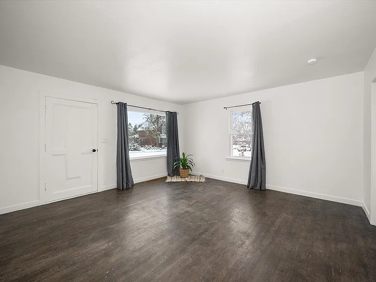 Main floor living room without staging