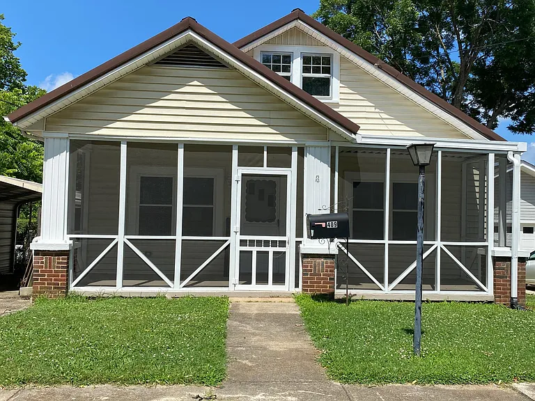 Handcrafted screened in porch. Perfect for coffee on breezy southern mornings and sultry afternoons sipping some iced tea!