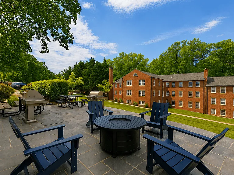 Park Crest Apartments Terrace with Fire Pit and Lounge Chairs