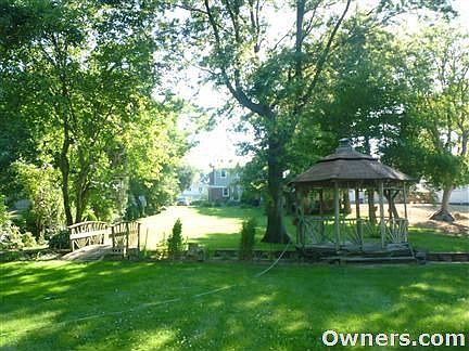 Back yard gazebo, walled creek, & bridge