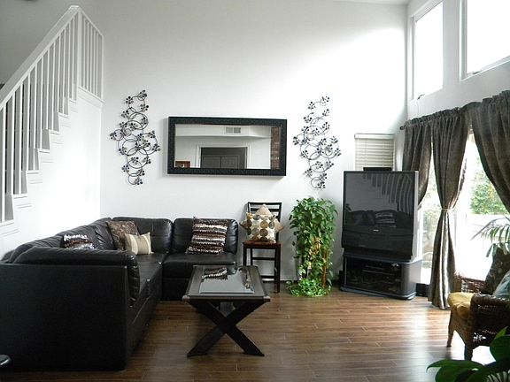 Living room w/entrance to back yard