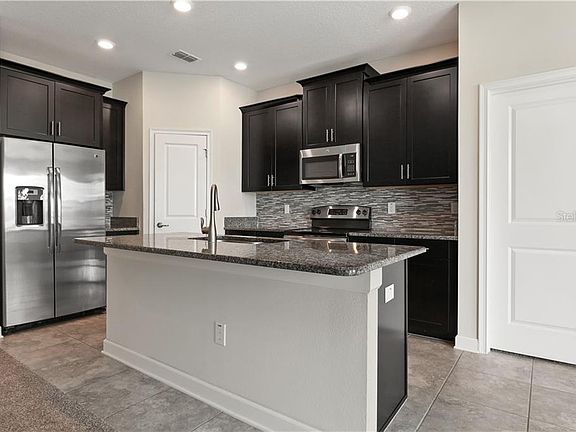 5th image of 11031 Redbud Woods Ln