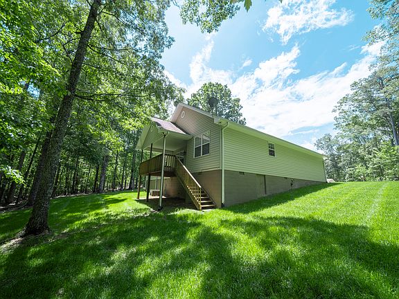 Left of house from wood line.